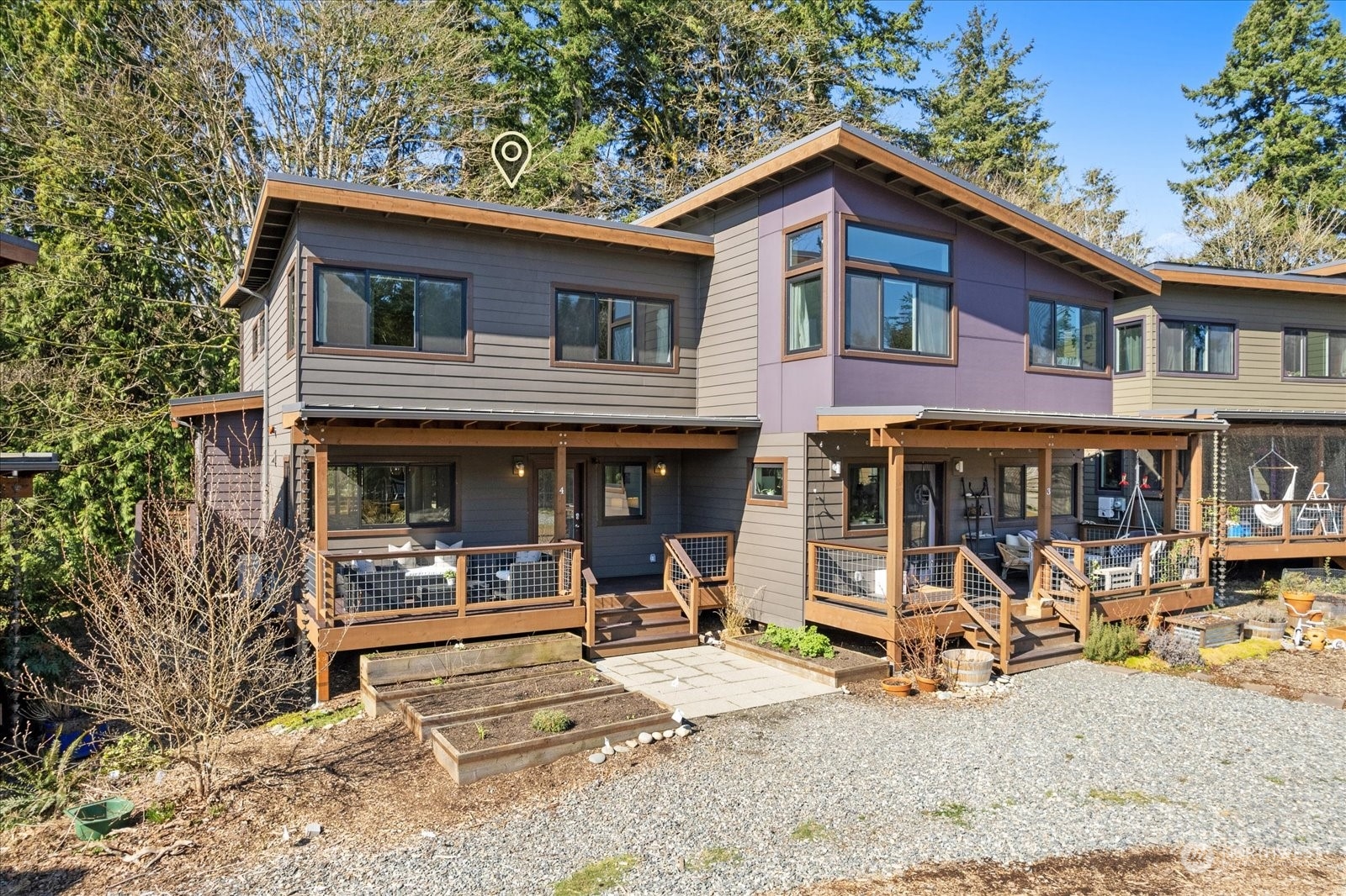 1402 194th Street Southeast, Unit 4 Bothell, WA 98012 - Photo 27 of 40 a view of a house with a patio and a yard