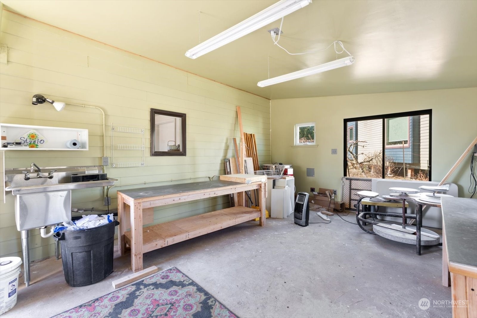 1402 194th Street Southeast, Unit 4 Bothell, WA 98012 - Photo 35 of 40 a bedroom with furniture and a large window