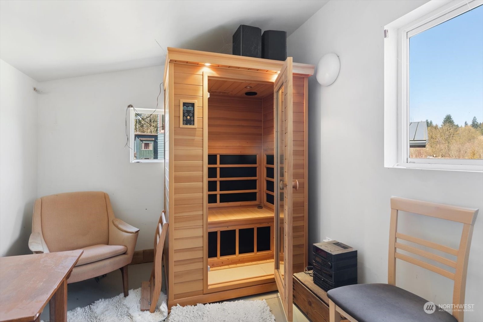1402 194th Street Southeast, Unit 4 Bothell, WA 98012 - Photo 36 of 40 a living room with furniture and a window