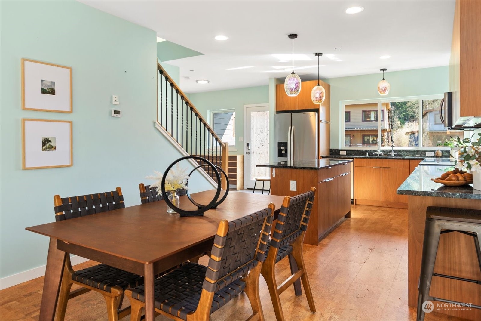 1402 194th Street Southeast, Unit 4 Bothell, WA 98012 - Photo 8 of 40 a large kitchen with a table and chairs in it