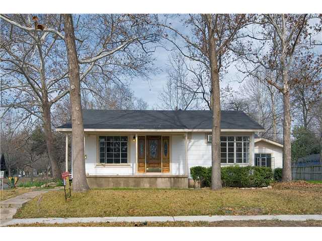 1512 Palo Duro Road Austin, TX 78757 - Photo 1 of 1 front view of a house with a yard