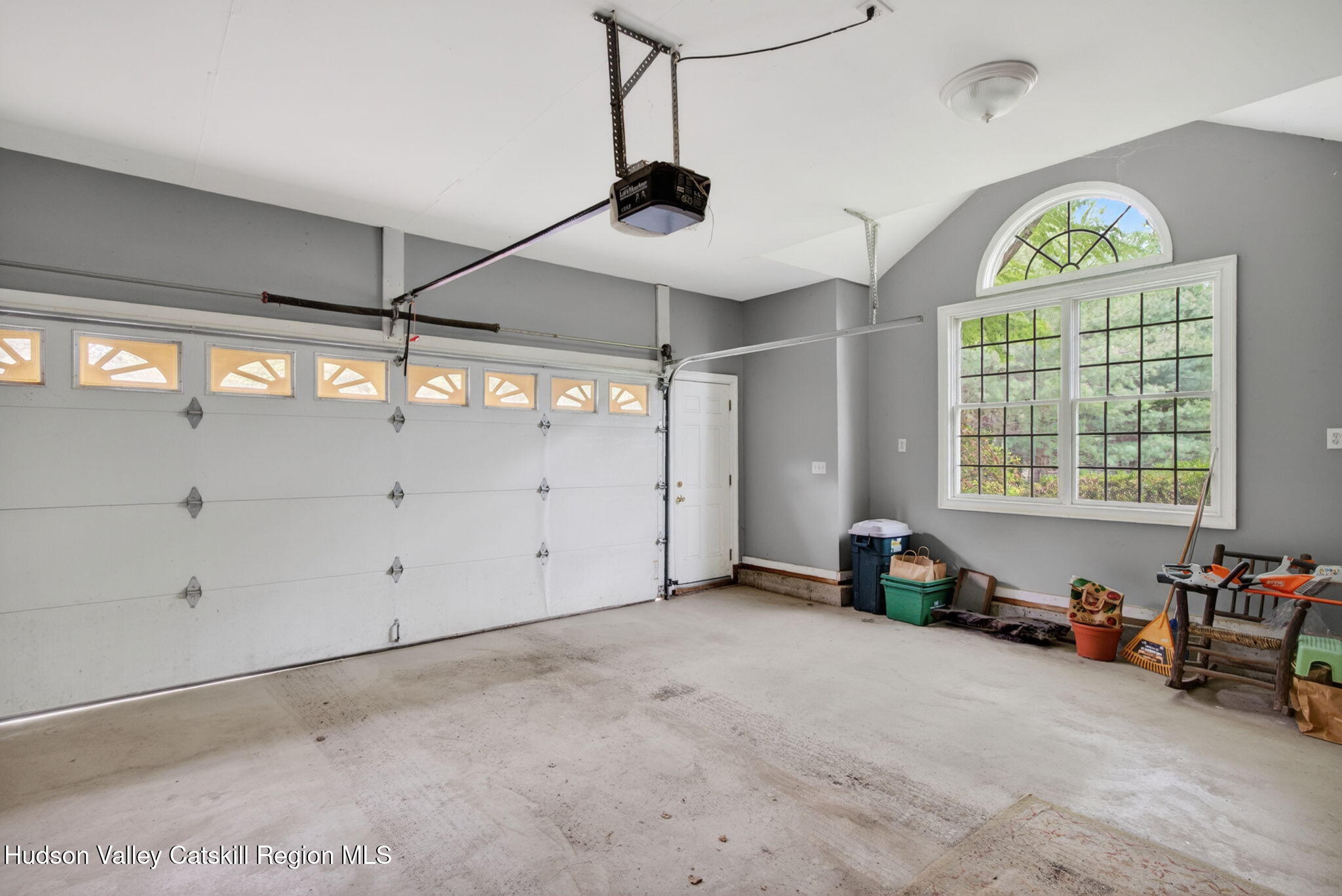 189 Bush Road Stone Ridge, NY 12484 - Photo 36 of 60 a view of an empty room with a window