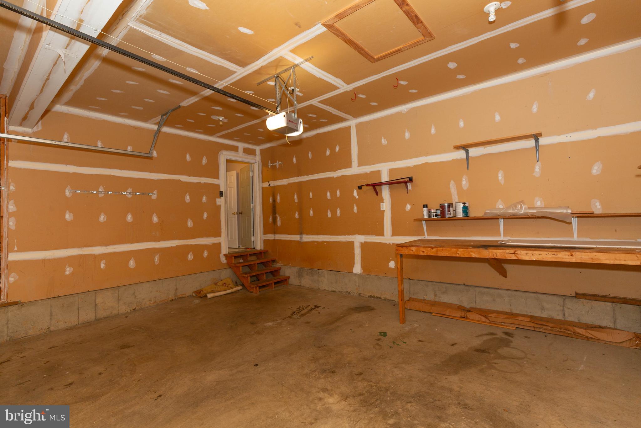 131 Cypress Point Drive Charles Town, WV 25414 - Photo 32 of 35 a view of an empty room with wooden floor