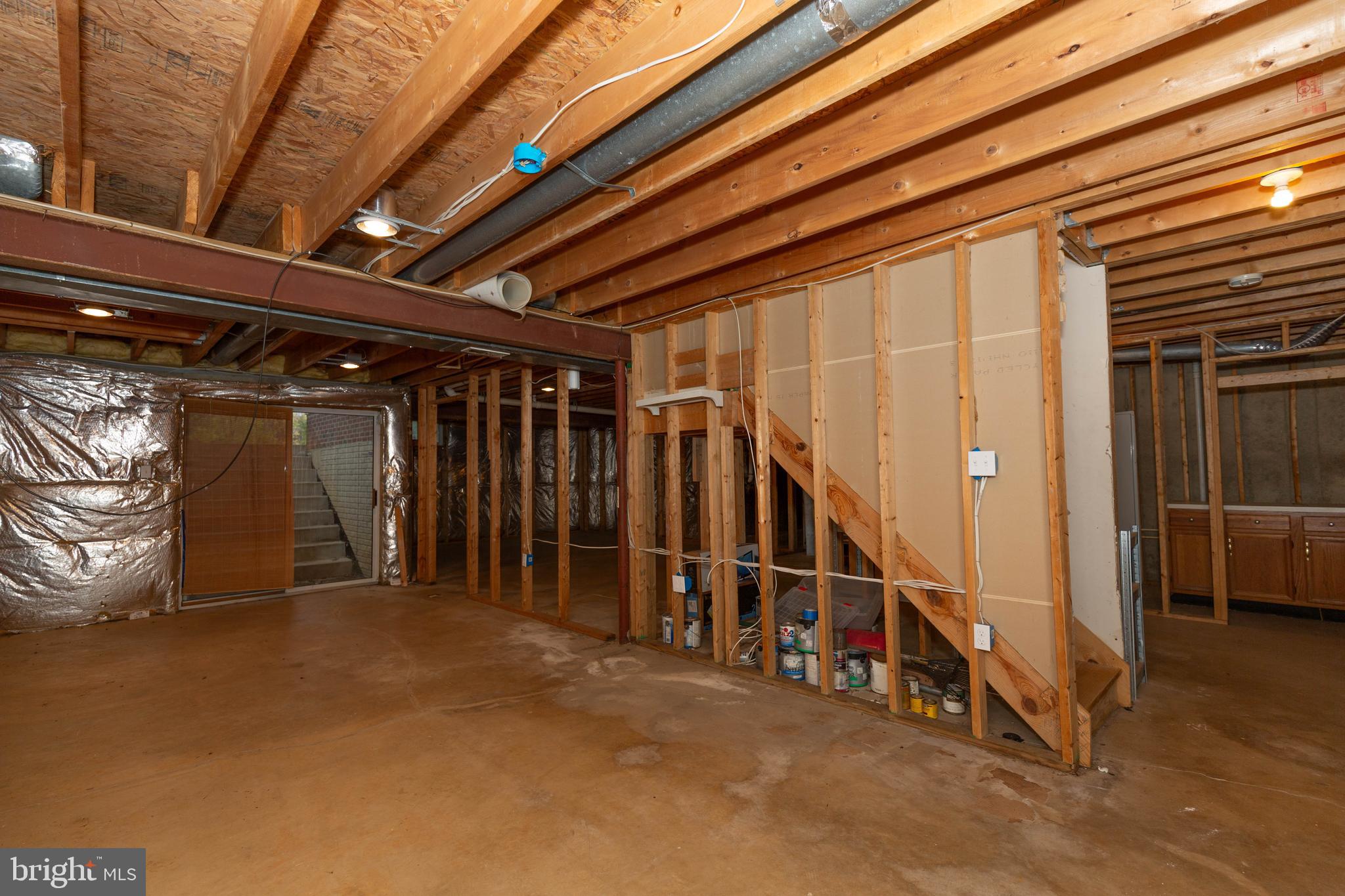 131 Cypress Point Drive Charles Town, WV 25414 - Photo 33 of 35 a view of an empty room with stairs