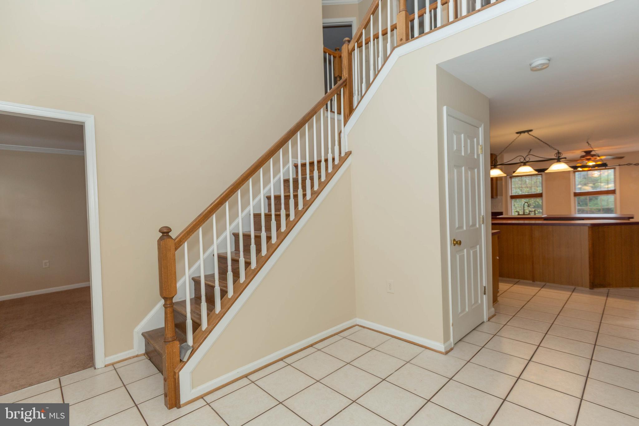 131 Cypress Point Drive Charles Town, WV 25414 - Photo 5 of 35 a view of a hallway with wooden floor and entryway