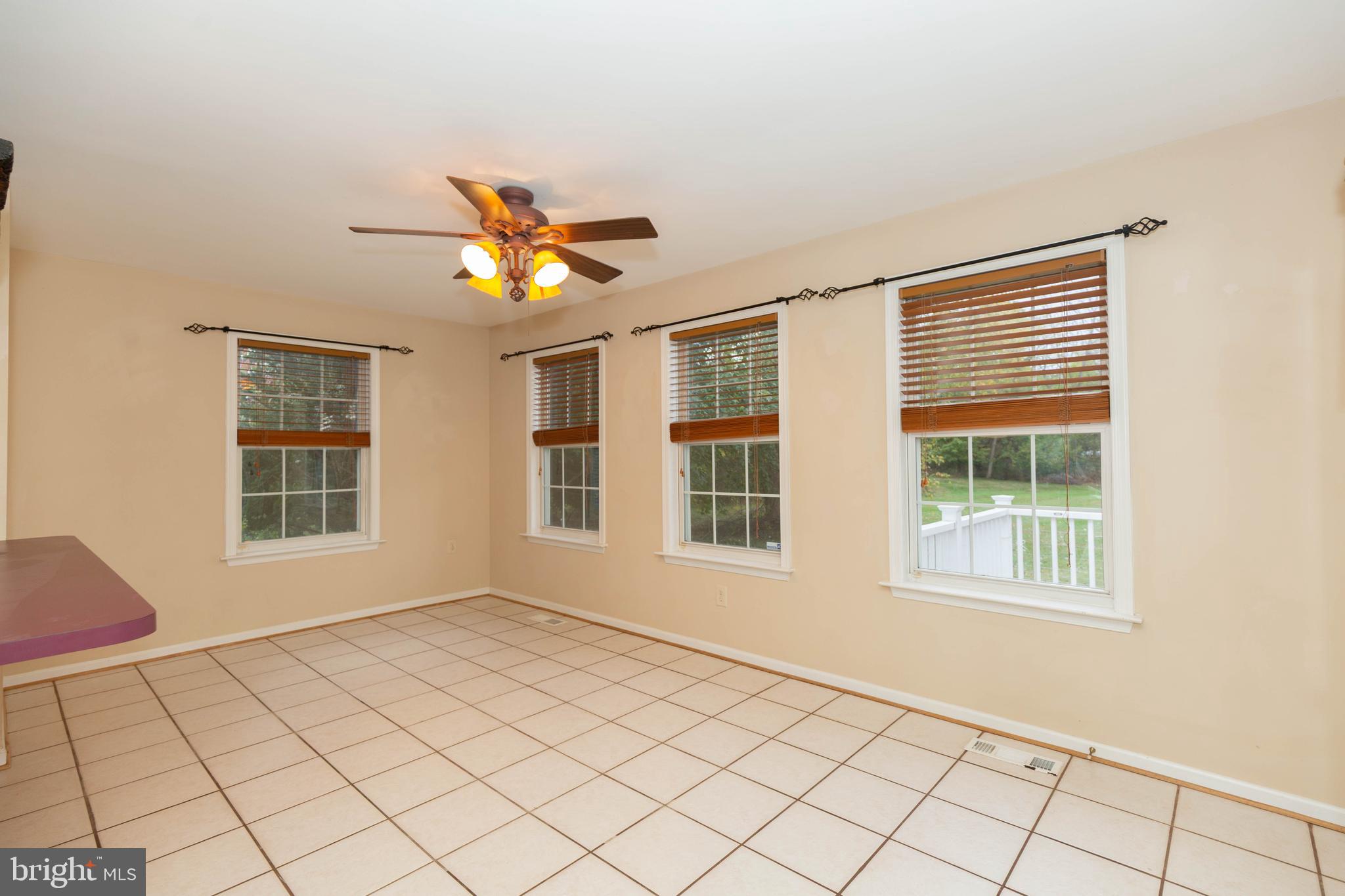 131 Cypress Point Drive Charles Town, WV 25414 - Photo 8 of 35 a view of an empty room with a window