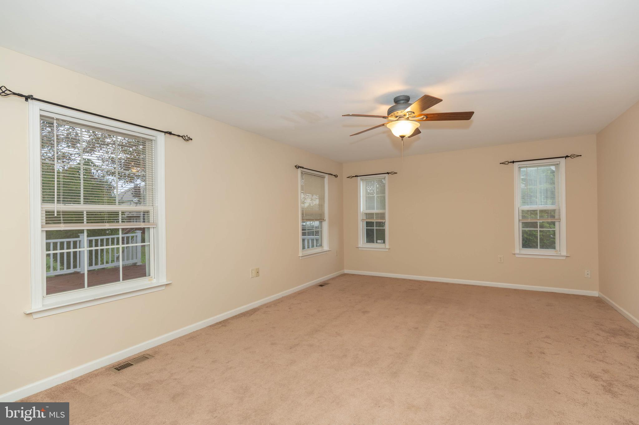 131 Cypress Point Drive Charles Town, WV 25414 - Photo 10 of 35 a view of an empty room with a window