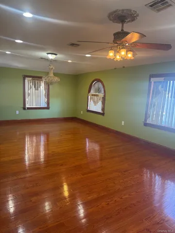 a view of a room with a kitchen