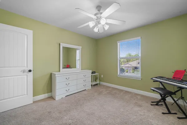 a room with furniture and a window