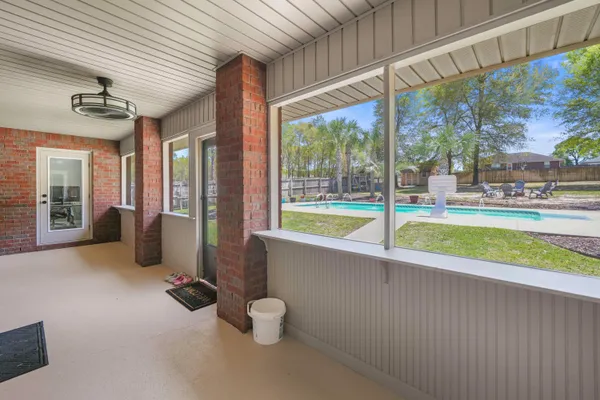 a view of a large swimming pool and outdoor space