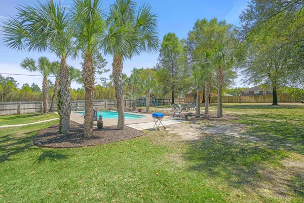 a view of a park with swings