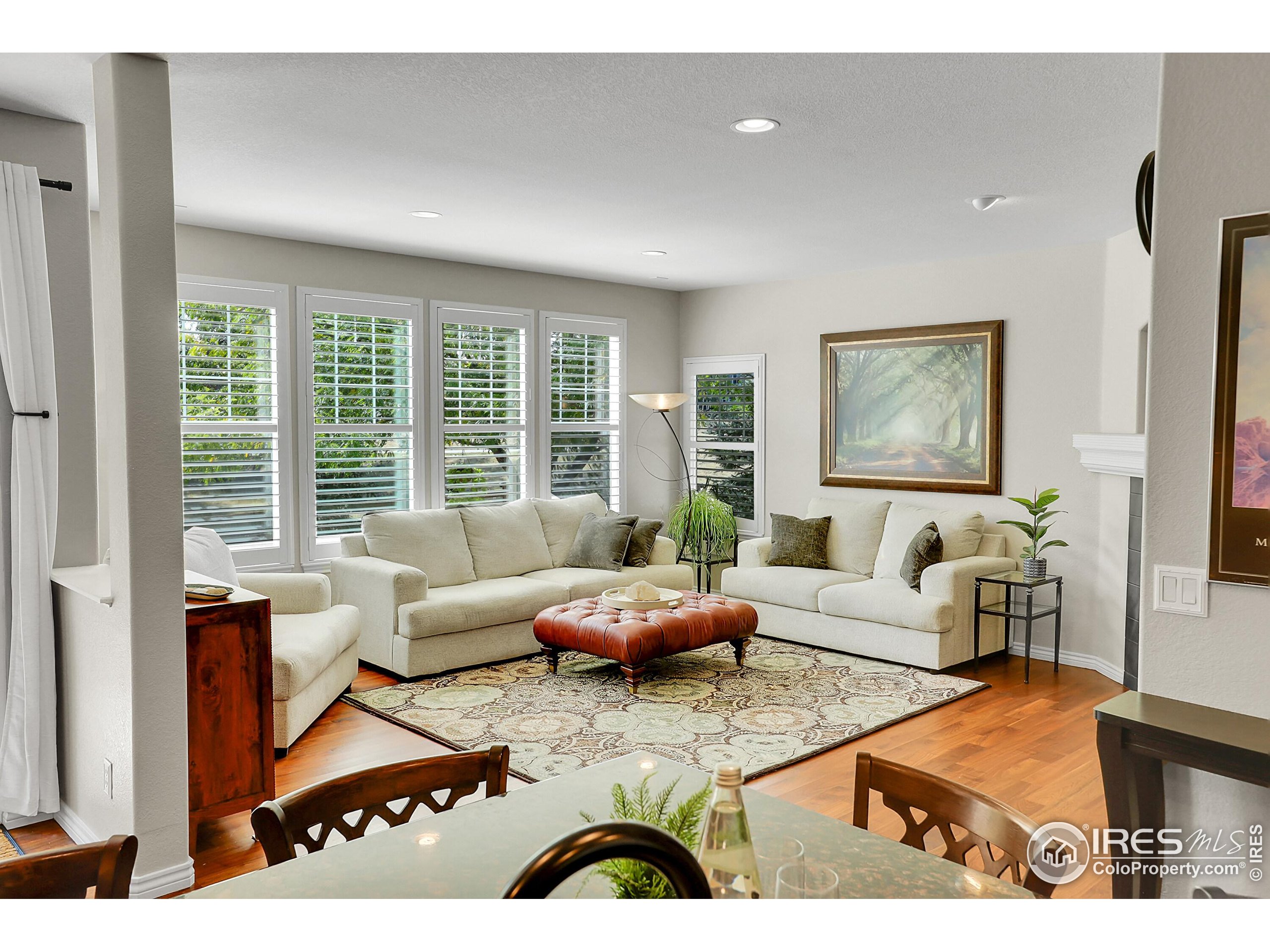 112 Austin Avenue Erie, CO 80516 - Photo 14 of 44 a living room with furniture and a large window