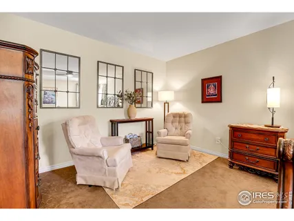 a view of an empty room and a fireplace