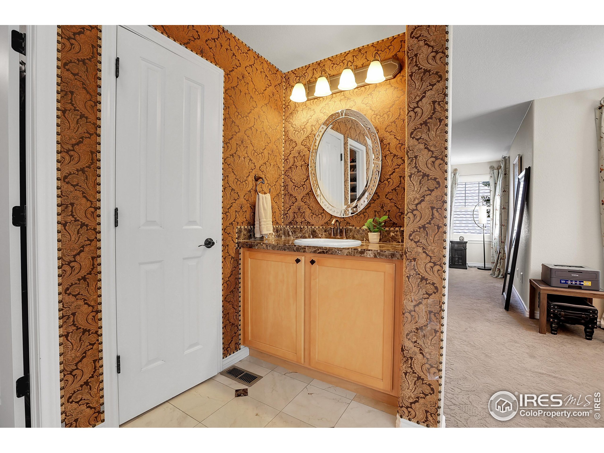 112 Austin Avenue Erie, CO 80516 - Photo 31 of 44 a view of a entryway door with wooden floor