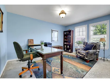 a bathroom with a double vanity sink mirror and toilet