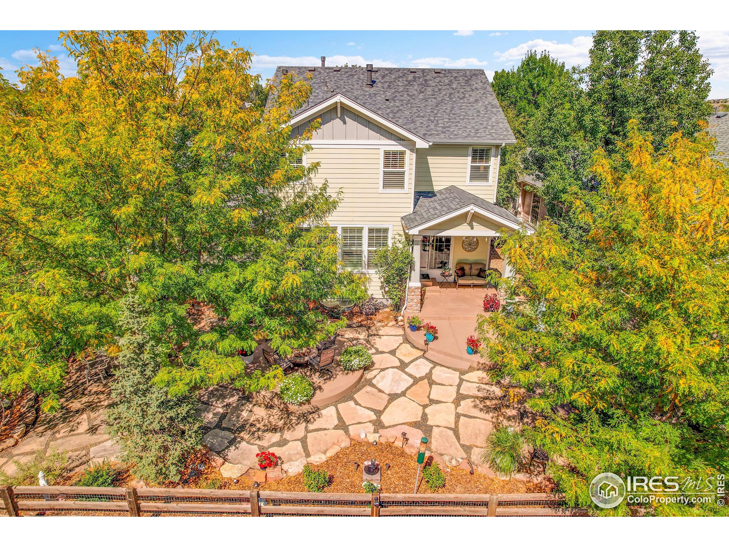 112 Austin Avenue Erie, CO 80516 - Photo 42 of 44 a front view of a house with a yard