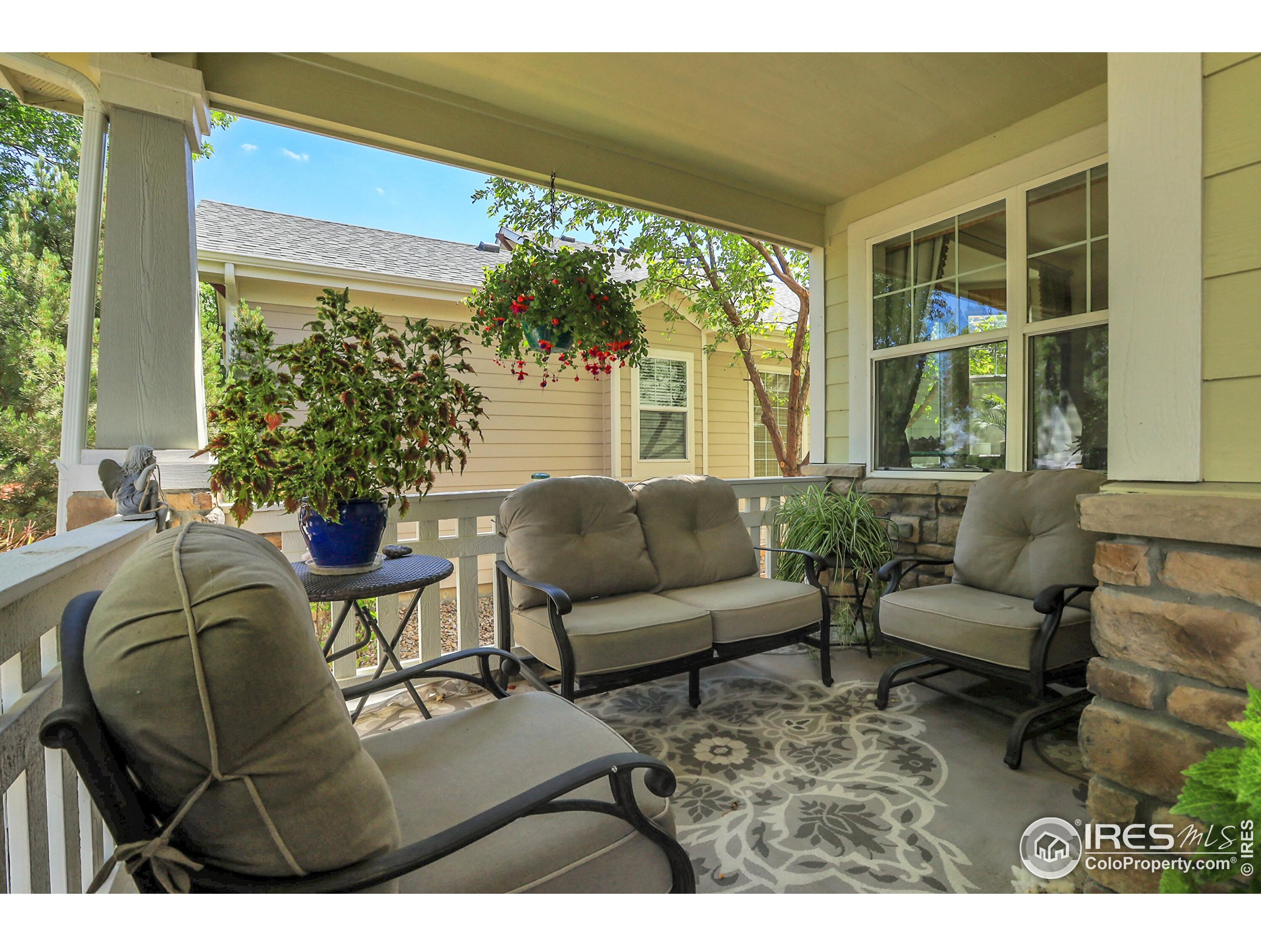 112 Austin Avenue Erie, CO 80516 - Photo 5 of 44 a living room with furniture and a large window