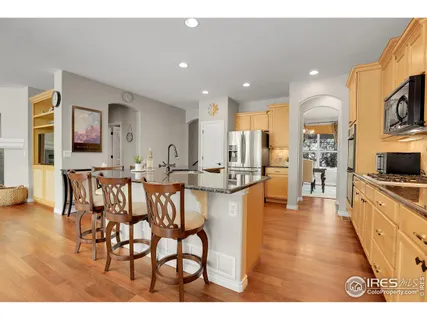 a view of a kitchen and dining room
