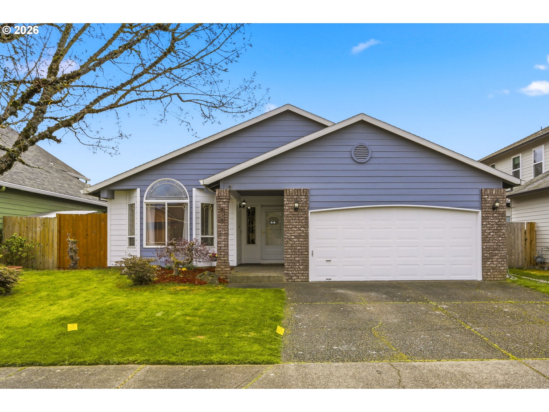 858 Southwest 24th Street Troutdale, OR 97060 - Photo 1 of 32 a front view of house with yard and garage