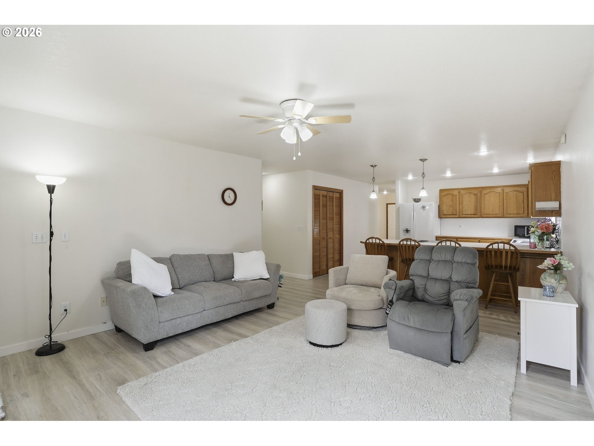 858 Southwest 24th Street Troutdale, OR 97060 - Photo 15 of 32 a living room with furniture and a view of kitchen