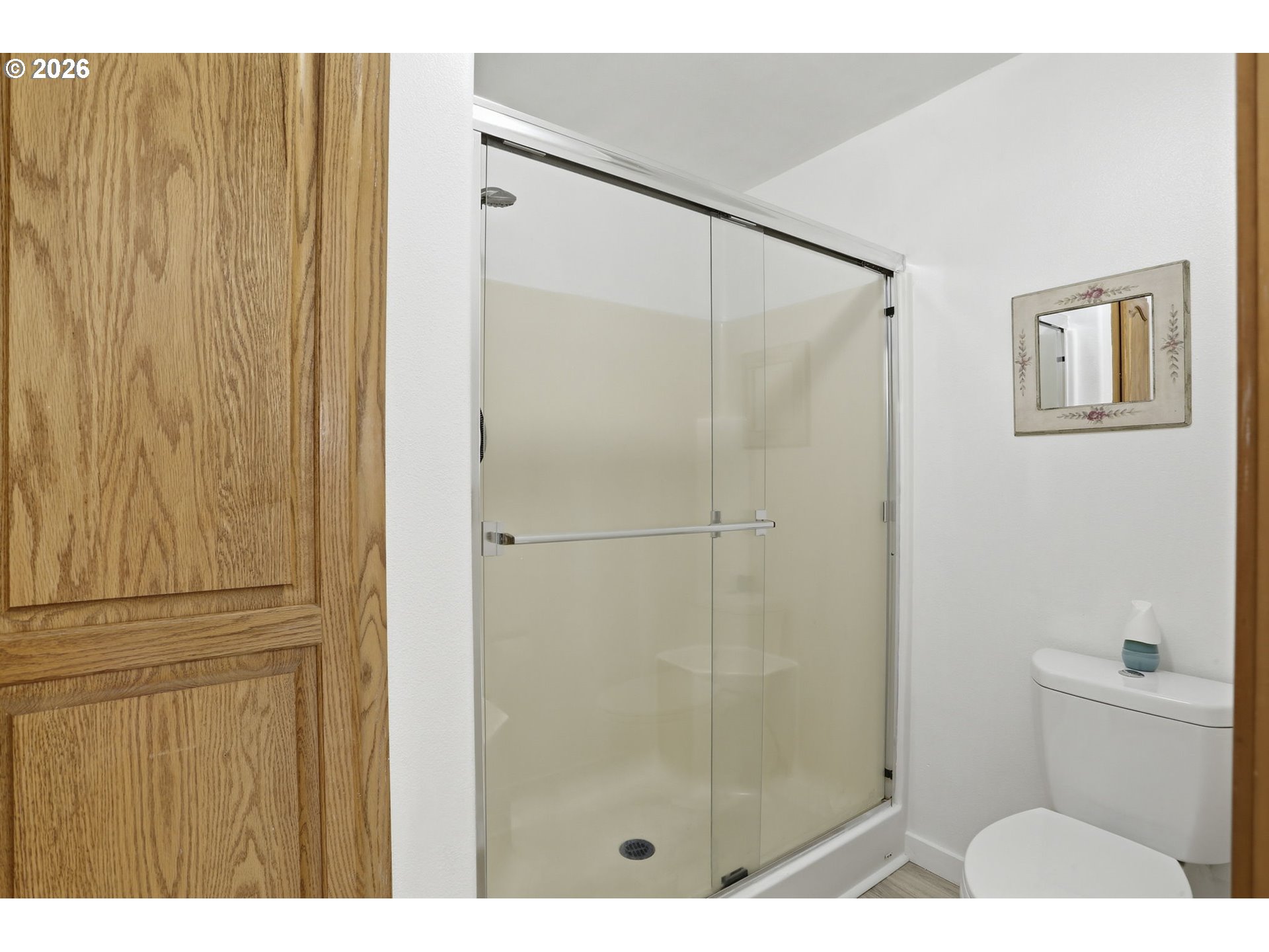 858 Southwest 24th Street Troutdale, OR 97060 - Photo 19 of 32 a bathroom with a shower and a toilet