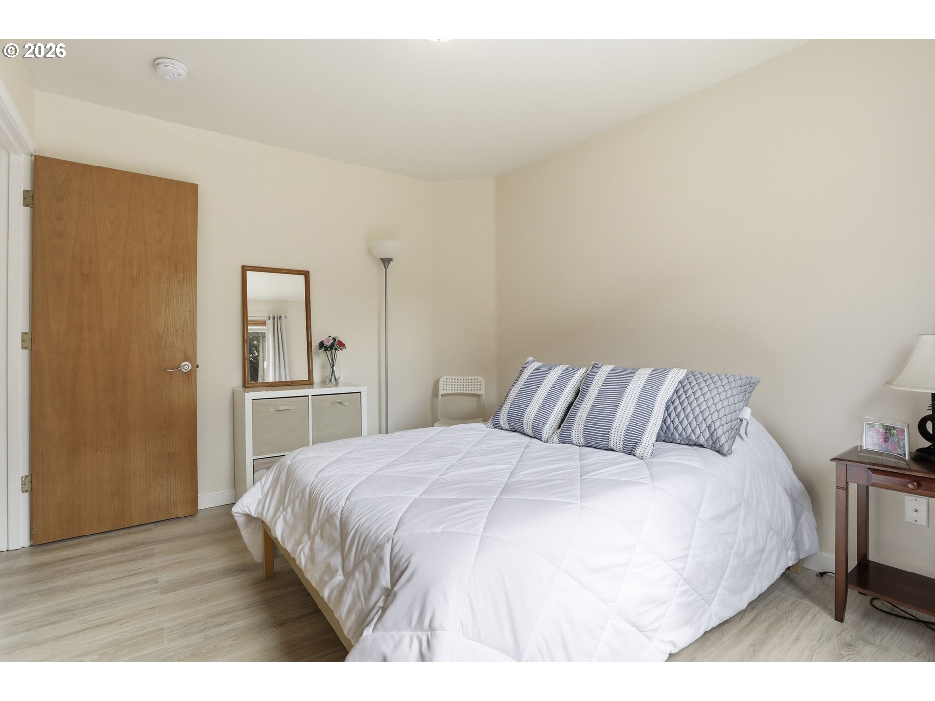 858 Southwest 24th Street Troutdale, OR 97060 - Photo 24 of 32 a large bed sitting in a bedroom and table