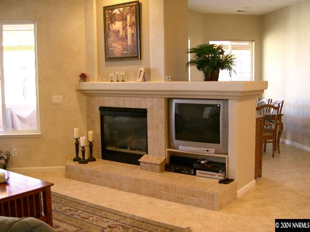 440 Octate Circle Reno, NV 89511 - Photo 3 of 8 a living room with furniture and a fireplace