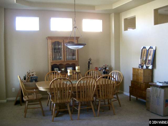 440 Octate Circle Reno, NV 89511 - Photo 6 of 8 a view of a dining room with furniture