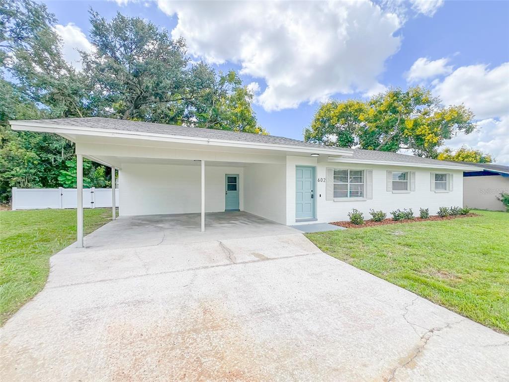 front view of a house and a yard