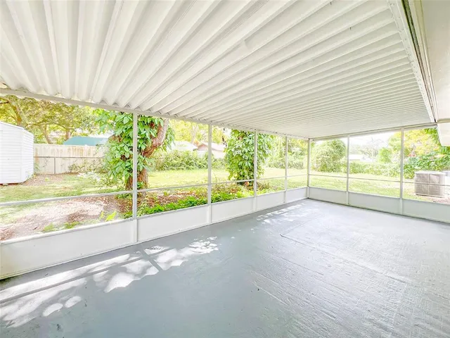 a view of a garden with an outdoor space