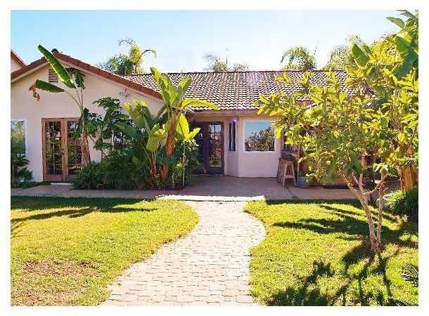 2095 Wandering Road Encinitas, CA 92024 - Photo 5 of 22 Two sets of French doors open to the back patios and yard to maximize views and outdoor living