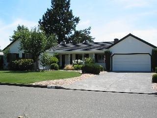 5766 Yerba Buena Road Santa Rosa, CA 95409 - Photo 1 of 6 front view of a house with a yard