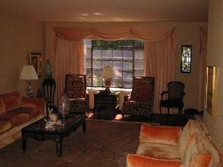 5766 Yerba Buena Road Santa Rosa, CA 95409 - Photo 5 of 6 a living room with furniture a window and a chandelier