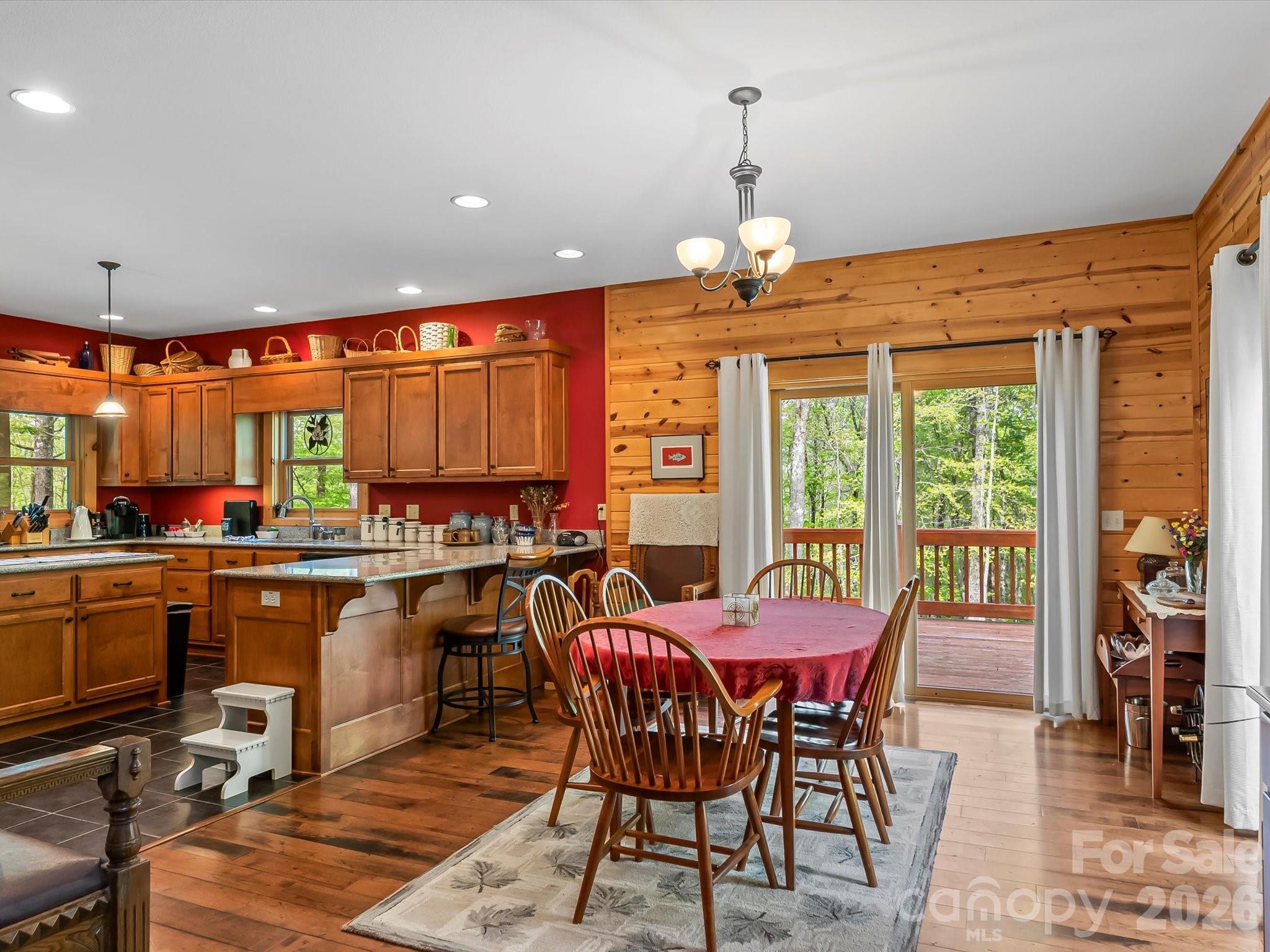 917 Otter Mountain Road Topton, NC 28781 - Photo 12 of 48 a view of a dining room with furniture window and outside view