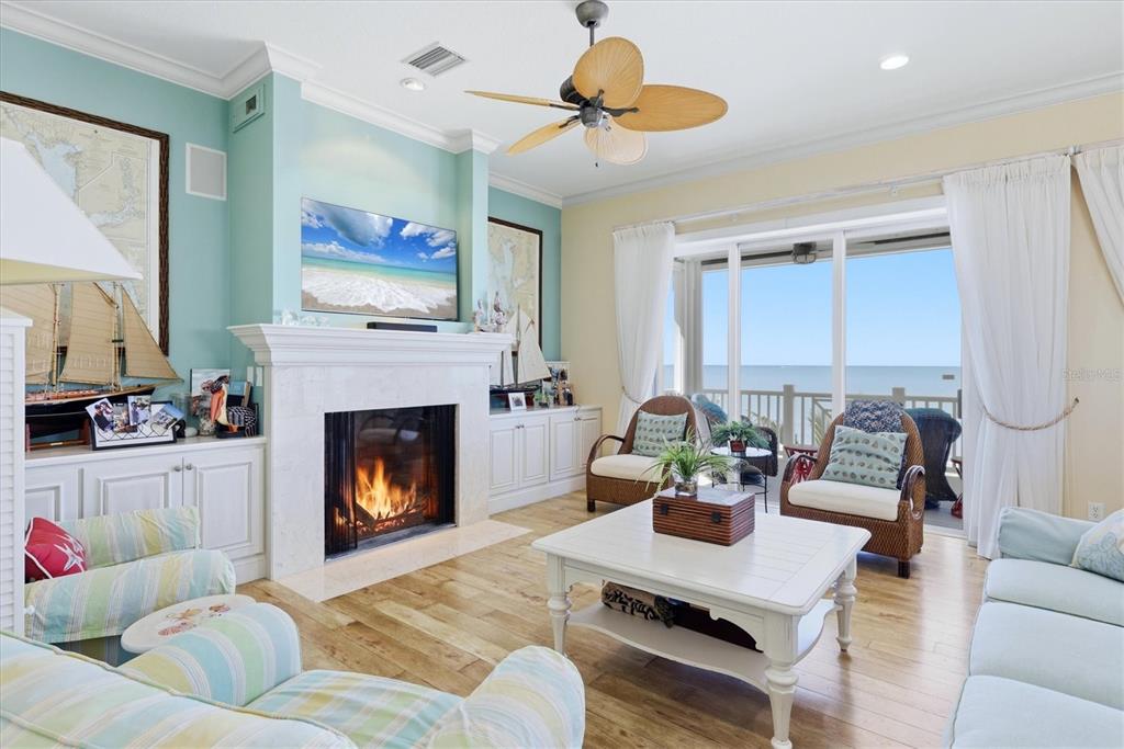 131 South Gulf Boulevard Boca Grande, FL 33921 - Photo 13 of 59 a living room with furniture and a fireplace