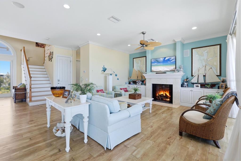 131 South Gulf Boulevard Boca Grande, FL 33921 - Photo 15 of 59 a living room with furniture and a fireplace