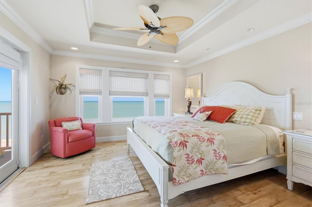 131 South Gulf Boulevard Boca Grande, FL 33921 - Photo 34 of 59 a bedroom with a bed and a couch