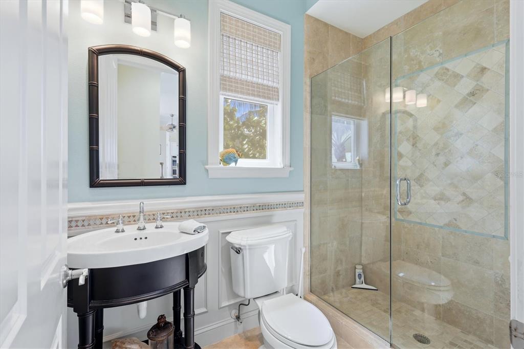 131 South Gulf Boulevard Boca Grande, FL 33921 - Photo 39 of 59 a bathroom with a sink a toilet and shower