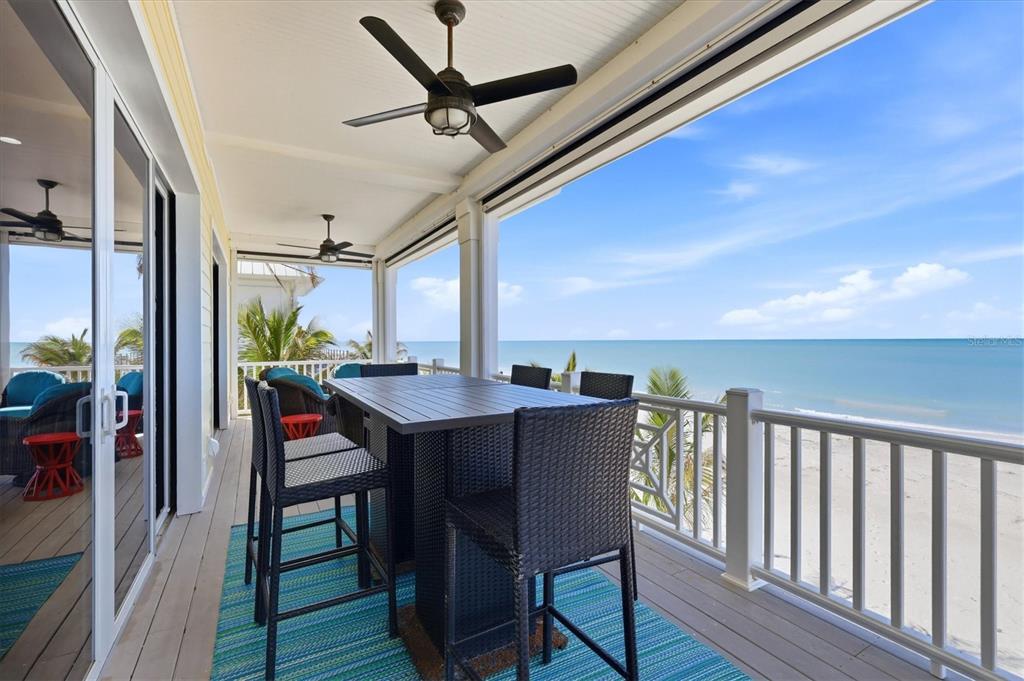131 South Gulf Boulevard Boca Grande, FL 33921 - Photo 42 of 59 a view of a dining room with furniture window and wooden floor