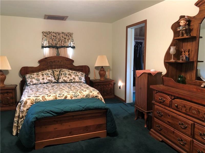 5886 Virginia Road Hermitage, PA 16148 - Photo 17 of 25 Master bedroom has a walk in closet.