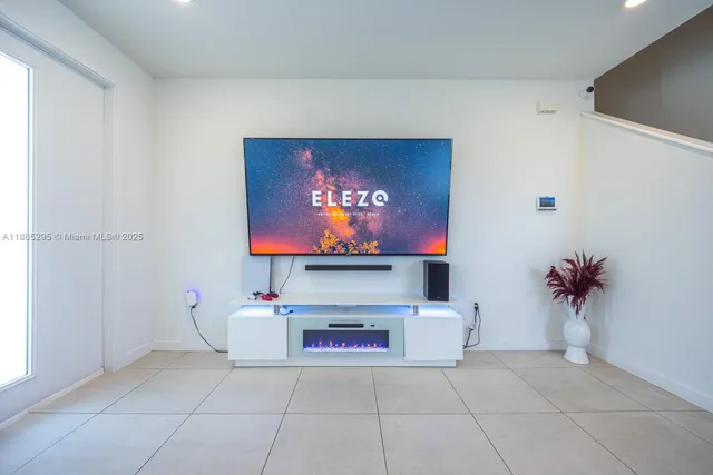 a kitchen with a sink stainless steel appliances and cabinets
