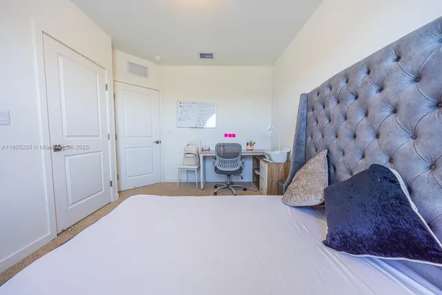 a bathroom with a toilet a sink and a mirror