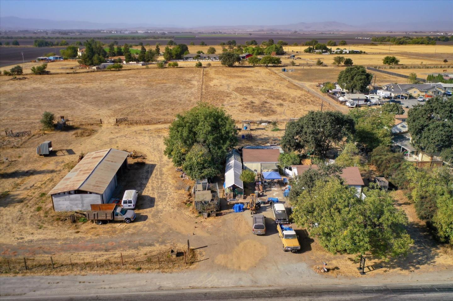 6520 Fairview Road Hollister, CA 95023 - Photo 2 of 39 an aerial view of residential houses with outdoor space and seating