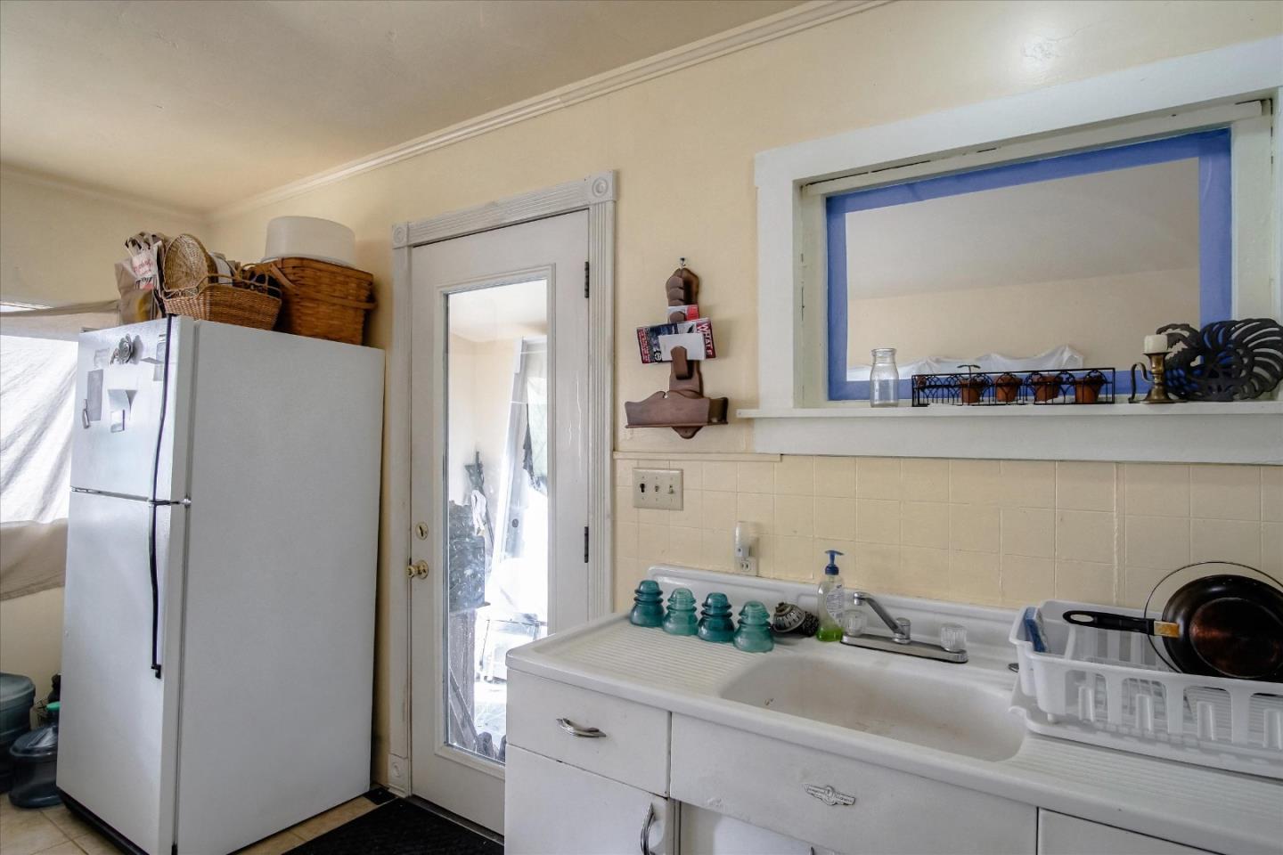 6520 Fairview Road Hollister, CA 95023 - Photo 13 of 39 a bathroom with a sink and a mirror
