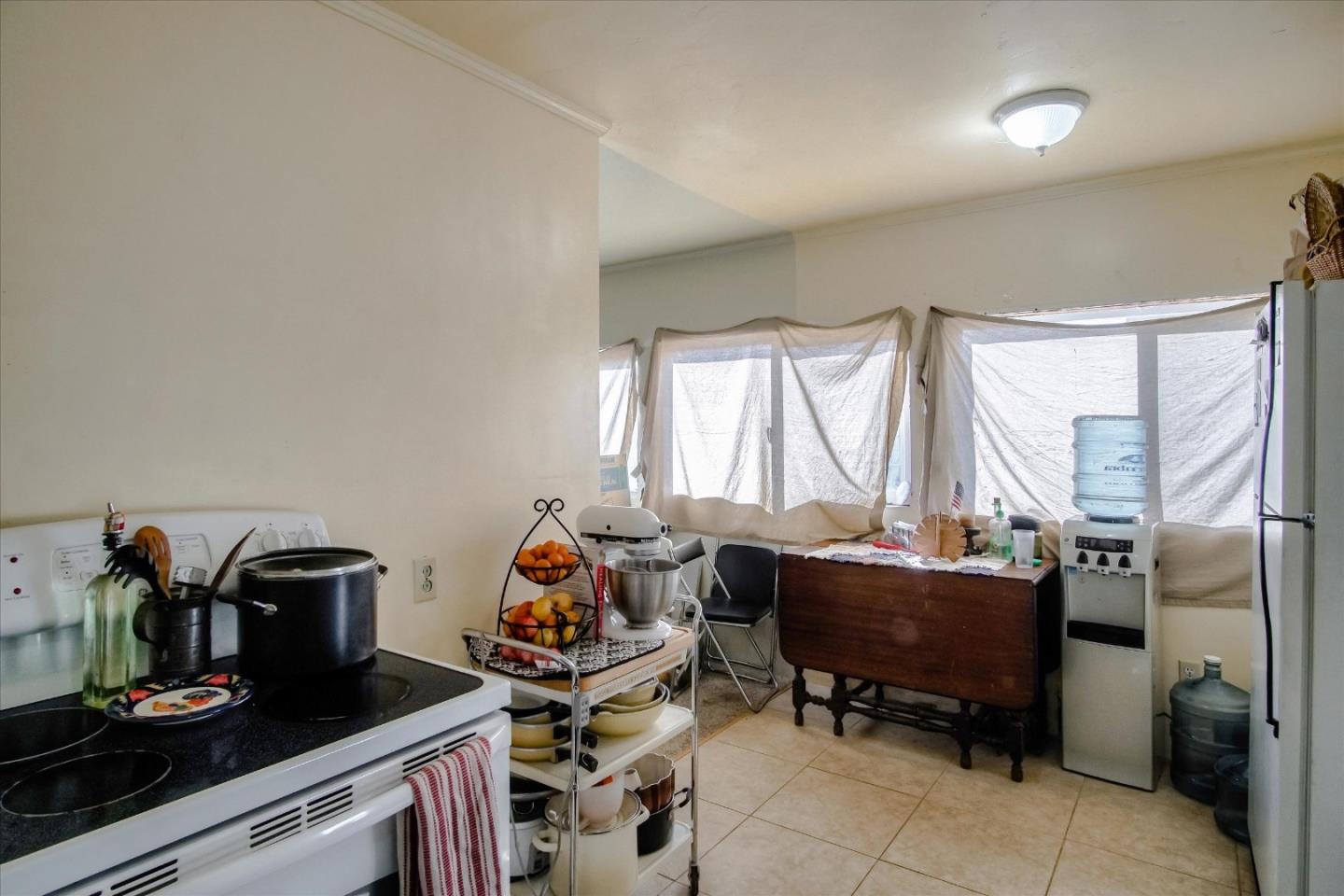6520 Fairview Road Hollister, CA 95023 - Photo 14 of 39 a view of a workspace with furniture and a window