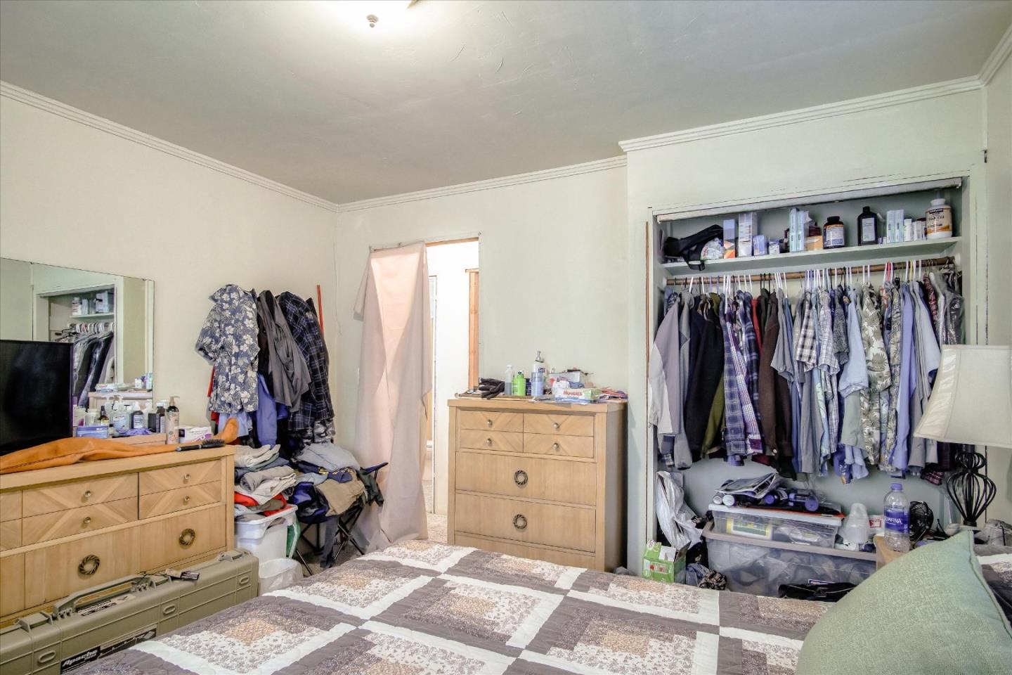 6520 Fairview Road Hollister, CA 95023 - Photo 16 of 39 a view of walk in closet with clothes and shoes