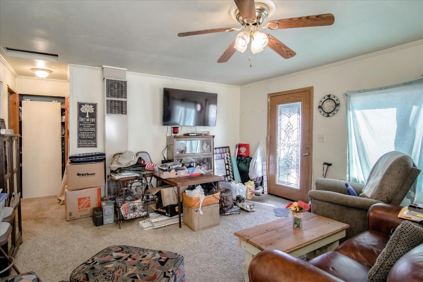 6520 Fairview Road Hollister, CA 95023 - Photo 9 of 39 a living room with furniture and a flat screen tv