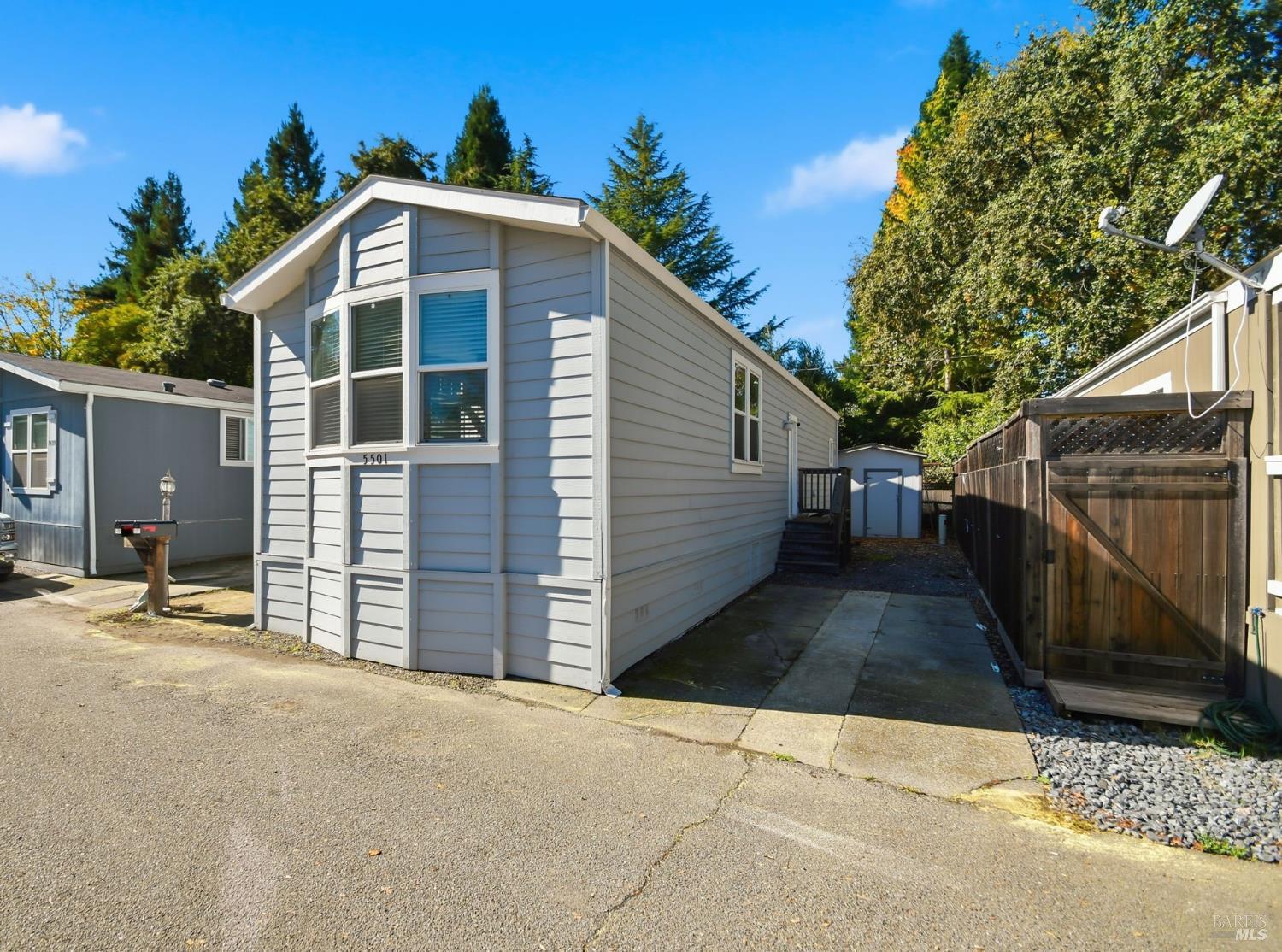 5501 Ranchito Way Santa Rosa, CA 95403 - Photo 2 of 20 a front view of a house with a yard