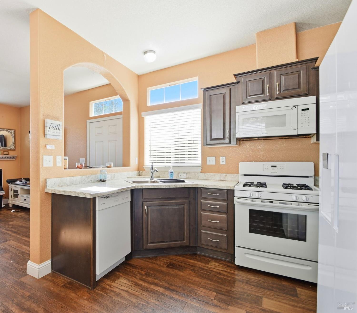 5501 Ranchito Way Santa Rosa, CA 95403 - Photo 8 of 20 a kitchen with a stove and a sink