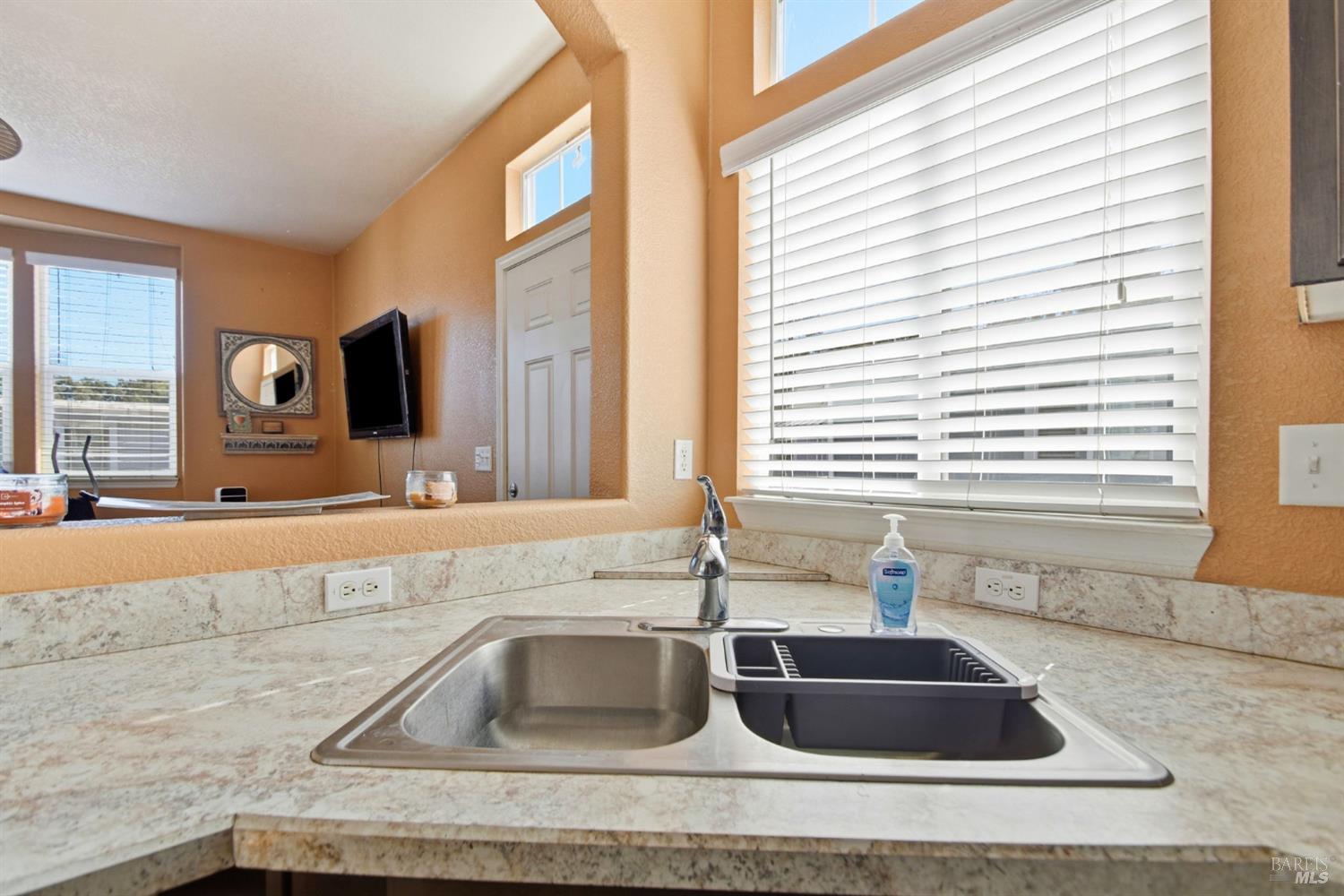 5501 Ranchito Way Santa Rosa, CA 95403 - Photo 9 of 20 a bathroom with a granite countertop sink and a bathtub